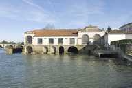 moulin à farine dit moulin Tramoy, puis minoterie des Grands Moulins de Gray, actuellement centrale hydroélectrique